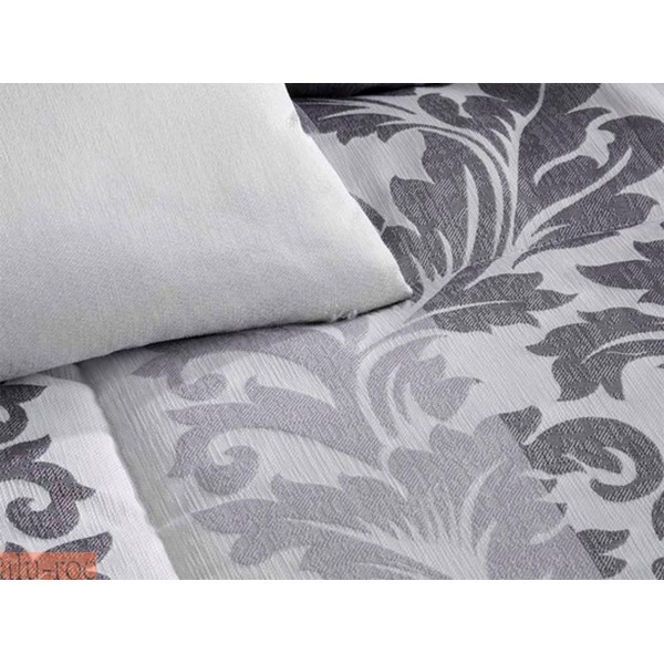 Detalle del estampado Toscana en color Gris Plata con cojín liso Madison
